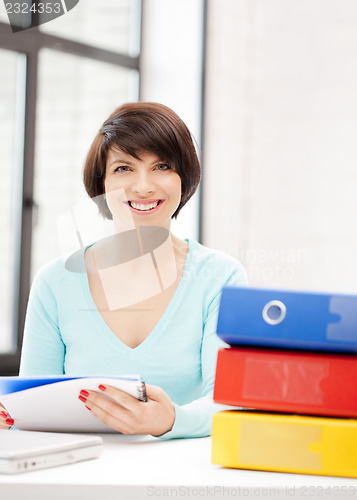 Image of woman with folders