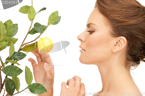 Image of lovely woman with lemon twig