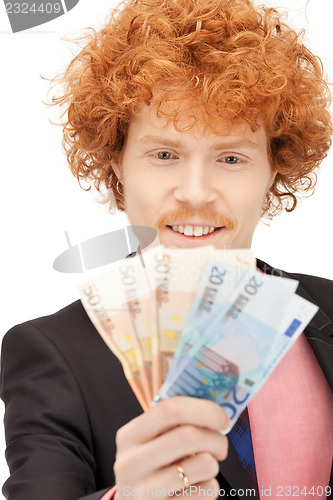 Image of handsome man with euro cash money