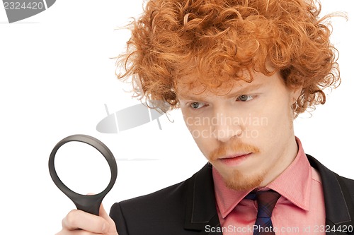 Image of man with magnifying glass