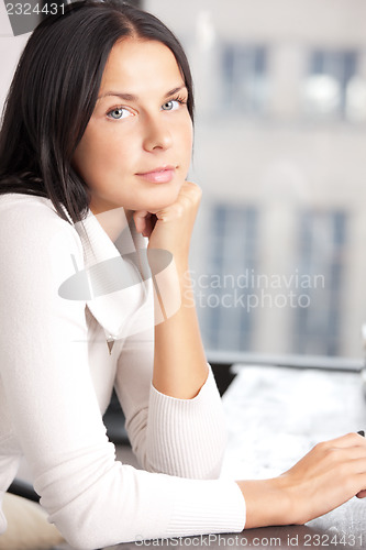 Image of calm and serious woman