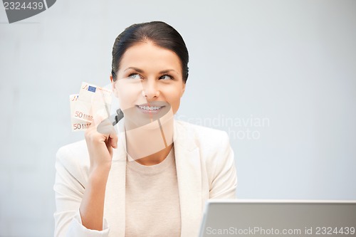 Image of lovely woman with euro cash money