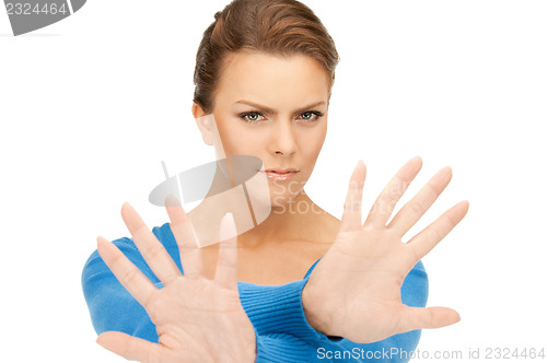 Image of woman making stop gesture