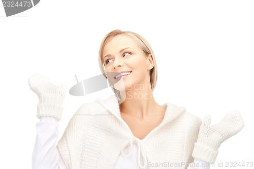 Image of beautiful woman in white sweater