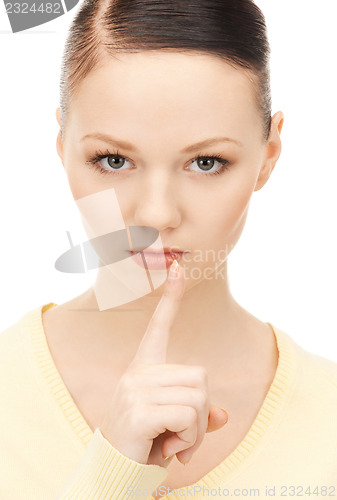 Image of finger on lips