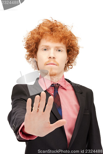 Image of man making stop gesture