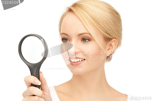 Image of woman with magnifying glass