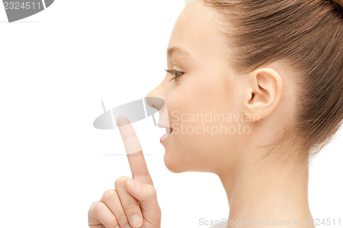 Image of finger on lips