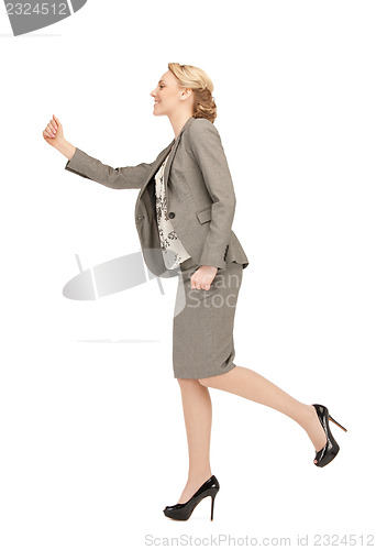 Image of walking woman