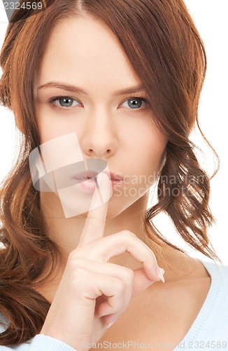 Image of finger on lips