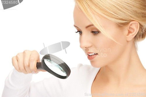 Image of woman with magnifying glass