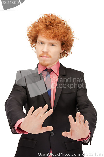 Image of man making stop gesture