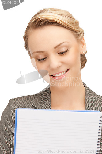 Image of happy woman with big notepad