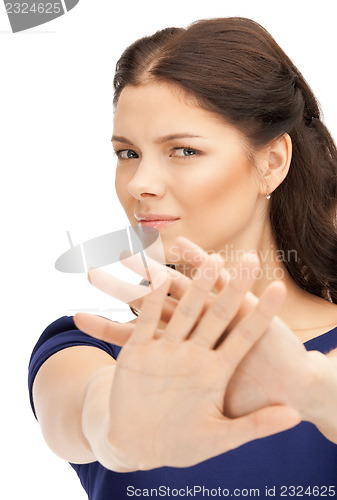 Image of woman making stop gesture