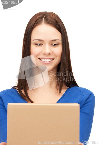 Image of attractive businesswoman with cardboard box