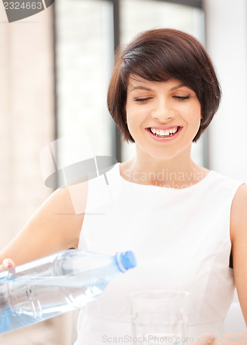Image of beautiful woman with glass of water