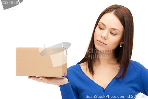 Image of attractive businesswoman with cardboard box