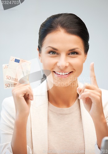 Image of lovely woman with euro cash money