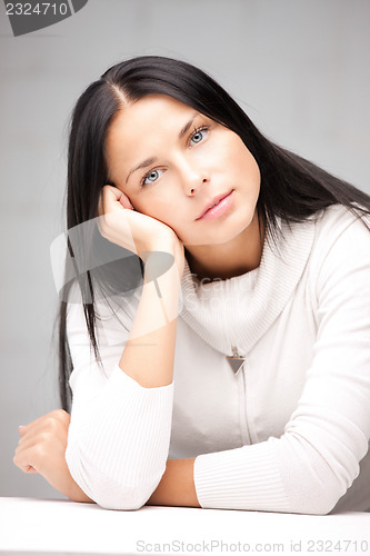 Image of calm and serious woman