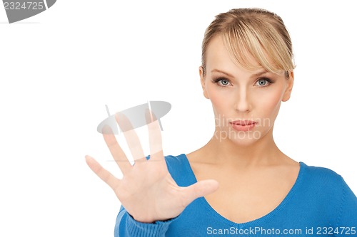 Image of woman making stop gesture