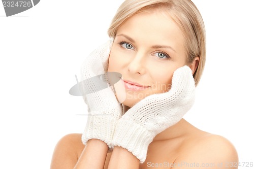 Image of beautiful woman in mittens