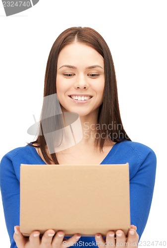 Image of attractive businesswoman with cardboard box