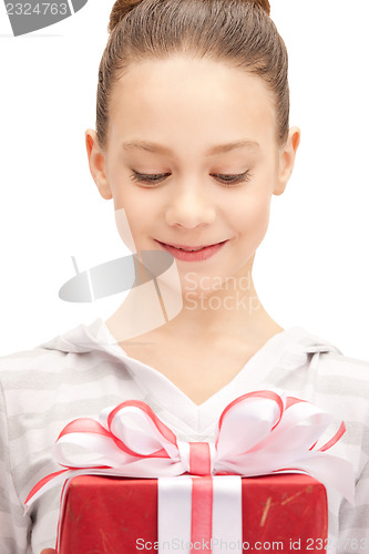 Image of happy teenage girl with gift box