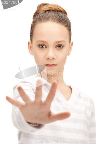 Image of teenage girl making stop gesture