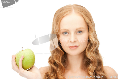 Image of young beautiful woman with green apple