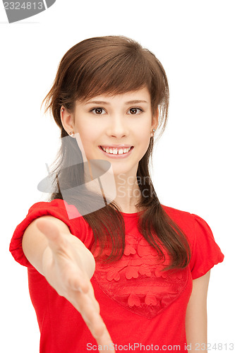 Image of teenage girl with an open hand ready for handshake