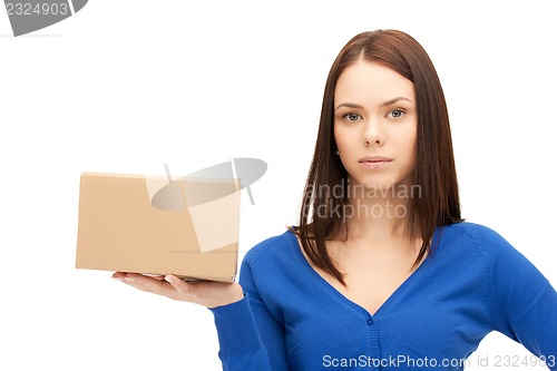Image of attractive businesswoman with cardboard box