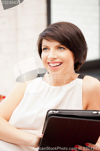 Image of happy woman with tablet pc computer