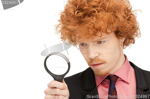 Image of man with magnifying glass