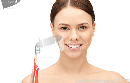 Image of beautiful woman with toothbrush