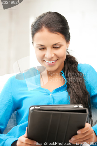 Image of happy woman with tablet pc computer