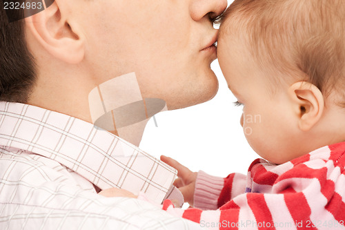 Image of happy father with adorable baby