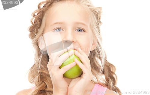 Image of little girl with green apple