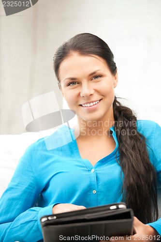 Image of happy woman with tablet pc computer
