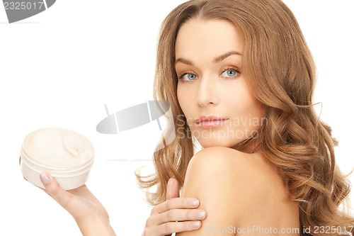 Image of beautiful woman with moisturizing creme