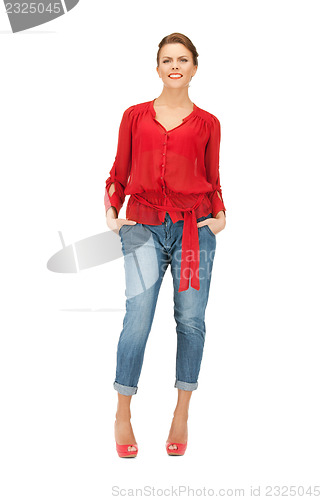Image of lovely woman in red blouse and jeans