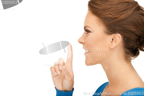 Image of finger on lips