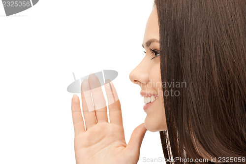 Image of woman whispering gossip