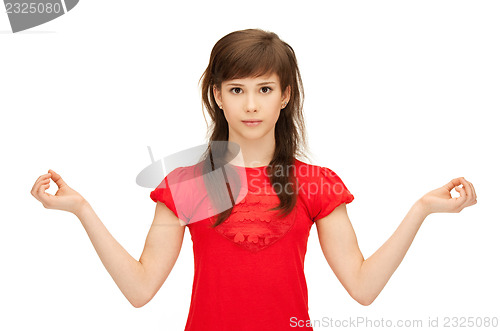 Image of teenage girl in meditation