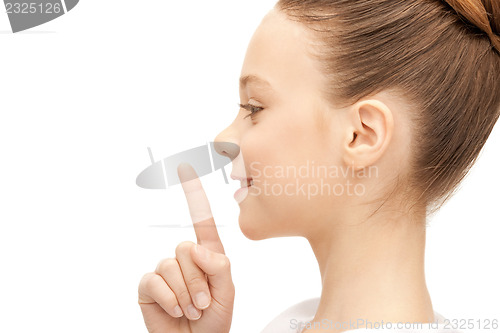 Image of finger on lips