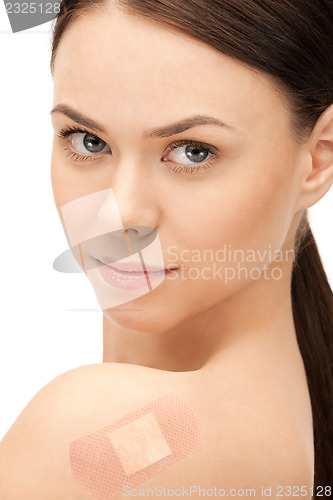 Image of beautiful woman with plaster