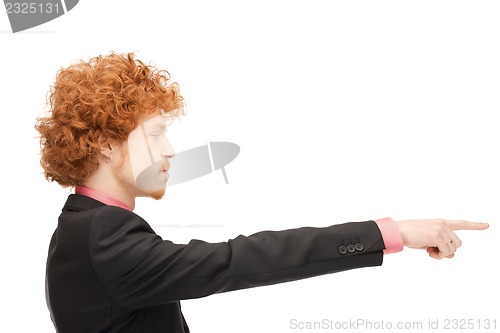 Image of businessman pointing his finger