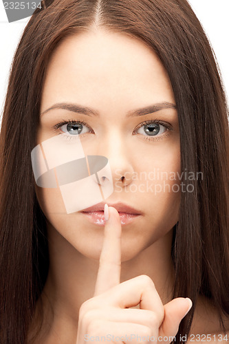 Image of finger on lips