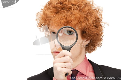 Image of man with magnifying glass