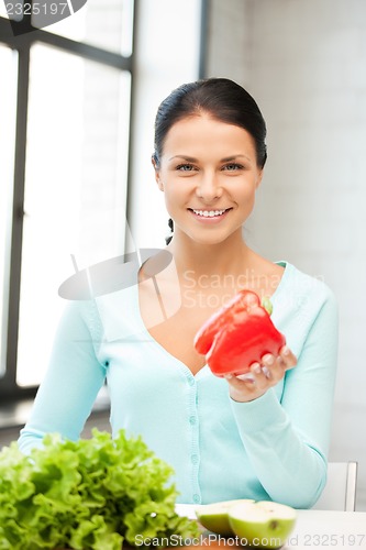 Image of beautiful woman in the kitchen
