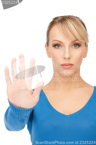 Image of woman making stop gesture